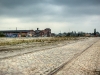 Nokken ses i baggrunden, sammen med de sidste gamle bygninger på havnen.